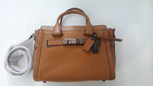 Load image into Gallery viewer, Coach Women's Mixed Leather Swagger 27, Dk/Light Saddle