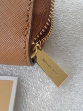Load image into Gallery viewer, Michael Kors Leather Continental Wristlet Brown (used)
