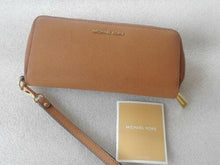 Load image into Gallery viewer, Michael Kors Leather Continental Wristlet Brown (used)
