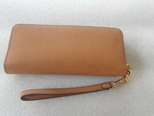 Load image into Gallery viewer, Michael Kors Leather Continental Wristlet Brown (used)
