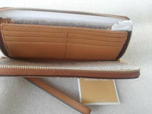 Load image into Gallery viewer, Michael Kors Leather Continental Wristlet Brown (used)
